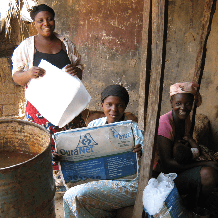 picture of 3 nigerian women with bednets