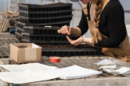 A woman works at a bench