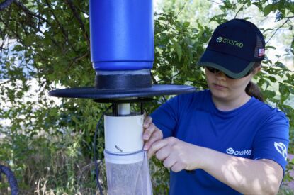 A Technician Adjusting A ABC Trap 1