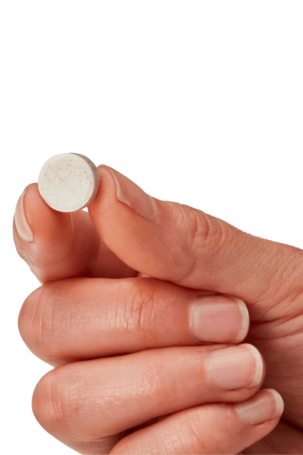 A Natular DT Tablet being held in a hand